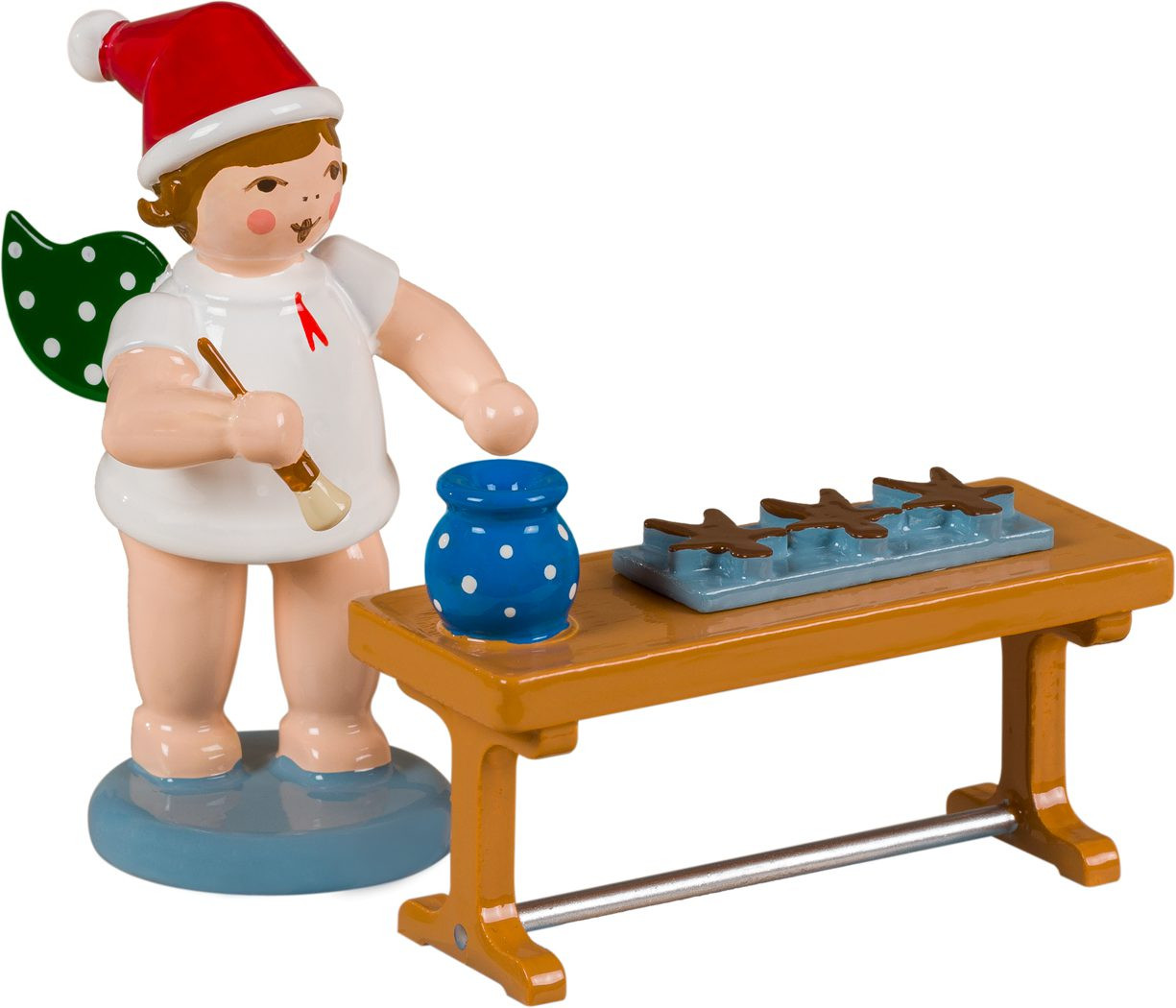 Ellmann Bäckerengel mit Lebkuchen am Tisch, mit Mütze